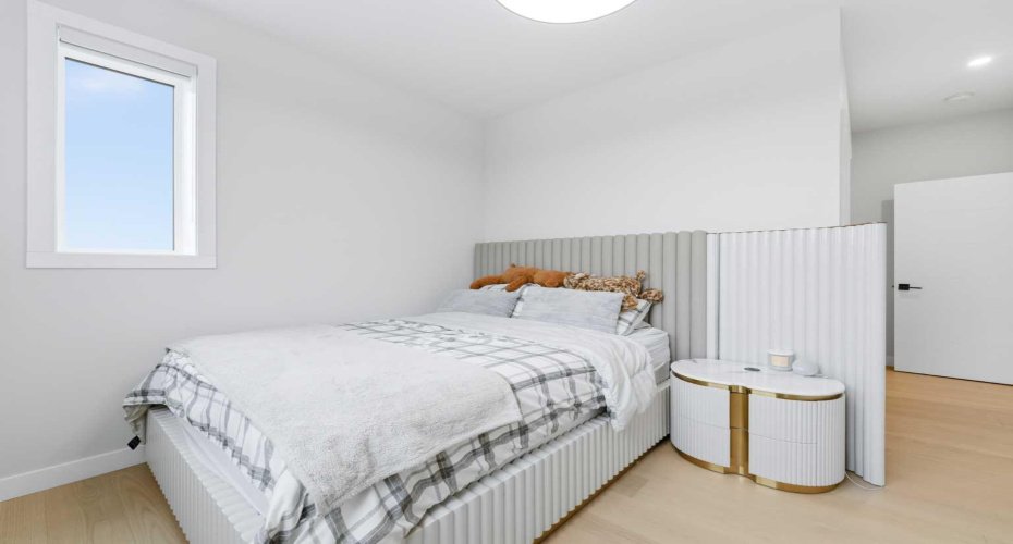 Bright and comfortable bedroom offers flexibility for family or guests.