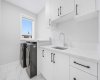 Dedicated laundry room adds convenience exactly where it is needed most.