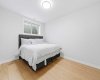 Comfortable lower-level bedroom offers privacy and convenience.