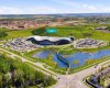 Scenic ponds and preserved natural areas contribute to the community's distinctive character.