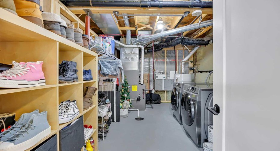 Utility room with washer and dryer