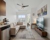 This image has been virtually staged to illustrate potential furniture arrangements and room functionality