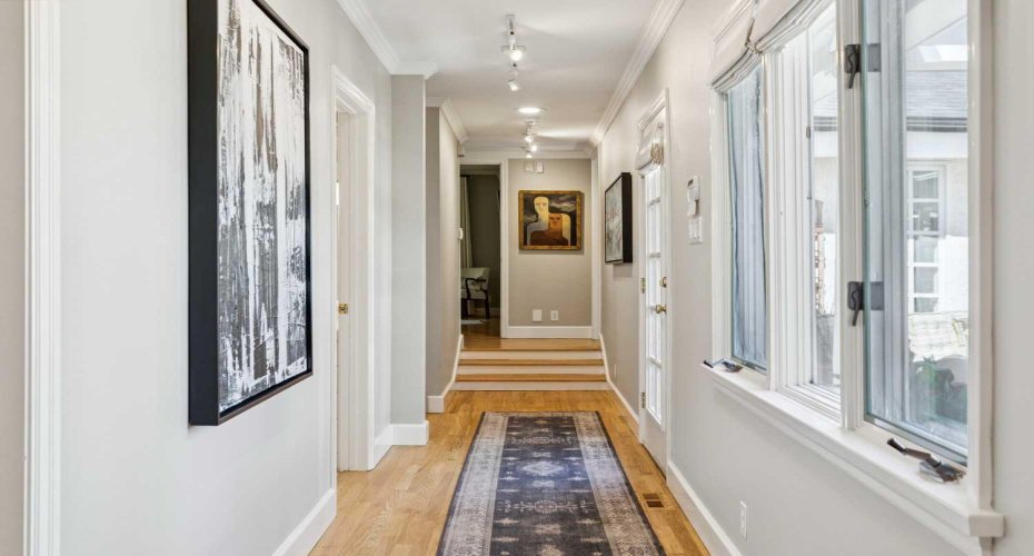 Hall to Primary bedroom + family room