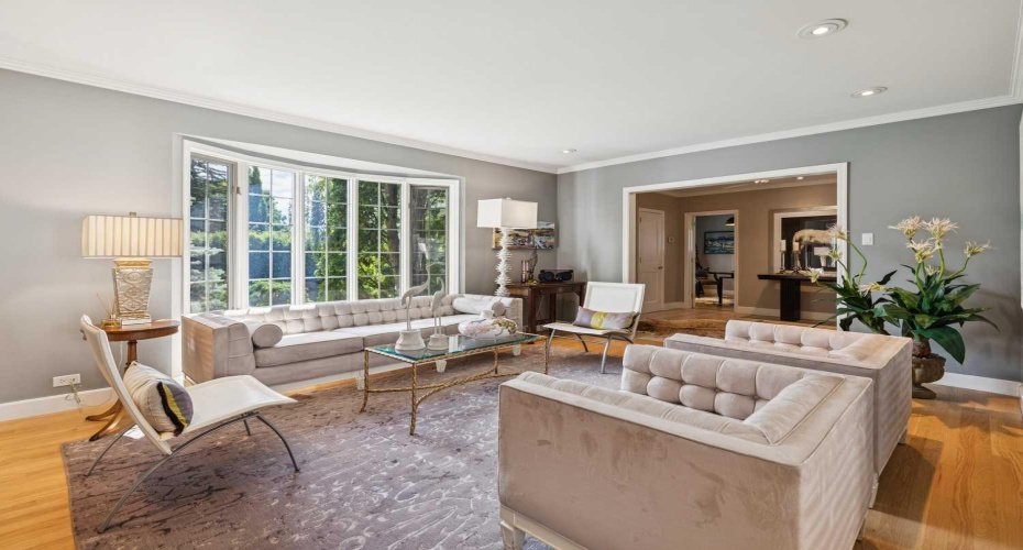 Flat painted ceilings, site-finished oak hardwood throughout + bright Interiors!