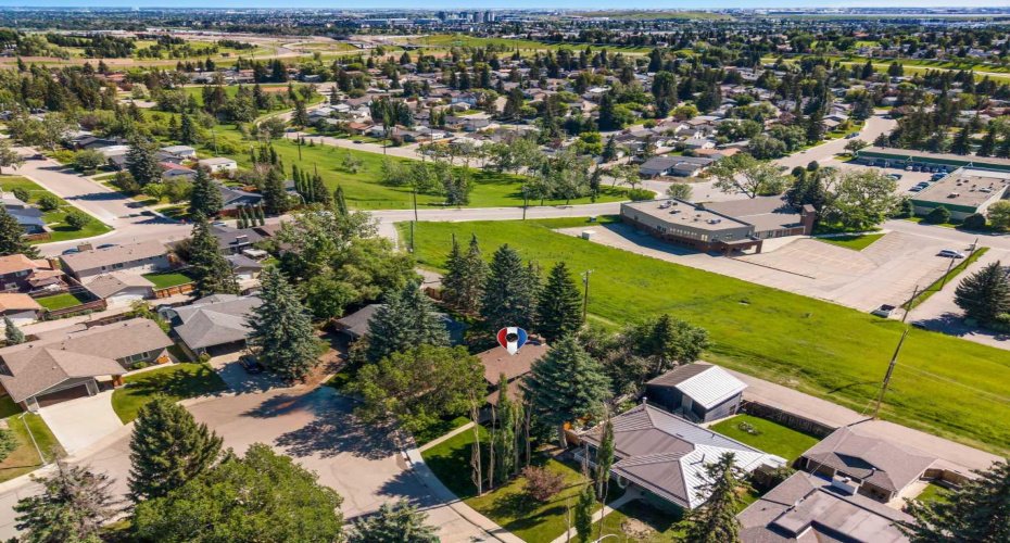 1102 Lake Christina Way, Calgary, Alberta T2J 2R3, 4 Bedroom Bedrooms, 0 ,3 BathroomBathrooms,Residential,For Sale,Lake Christina,0,A2323564