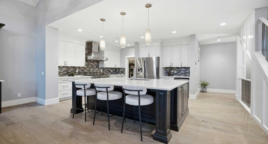 201 Stonemere Bay, Chestermere, Alberta T1X 0S1, 4 Bedrooms Bedrooms, ,4 BathroomsBathrooms,Residential,For Sale,Stonemere,A2325739
