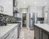 201 Stonemere Bay, Chestermere, Alberta T1X 0S1, 4 Bedrooms Bedrooms, ,4 BathroomsBathrooms,Residential,For Sale,Stonemere,A2325739