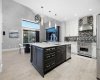 201 Stonemere Bay, Chestermere, Alberta T1X 0S1, 4 Bedrooms Bedrooms, ,4 BathroomsBathrooms,Residential,For Sale,Stonemere,A2325739