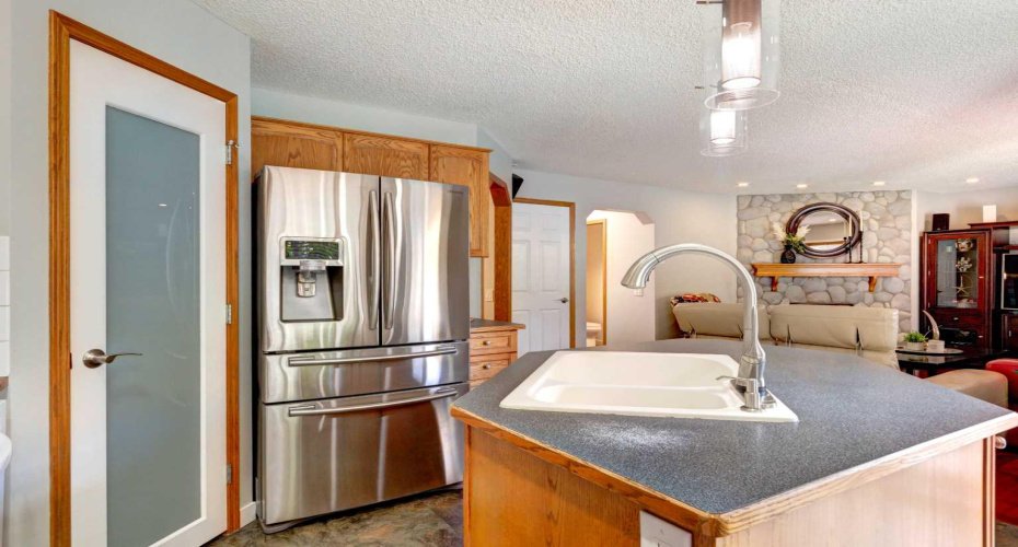 Pantry to the left presents more functional storage space~Beautiful Ceramic Sink~