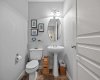 A convenient main floor powder room keeps things practical for busy mornings and easy for guests.