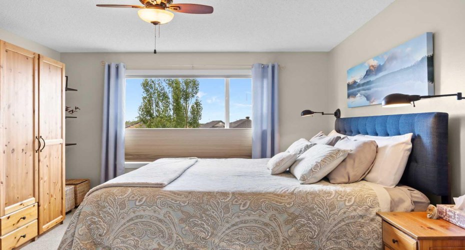 Wake up slowly here: treetop views out the window, room for a king, and space left over for a reading chair you'll actually use.