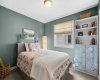The second bedroom is bright and generously sized, with room for a full bed, bookshelves, and a personality all its own.