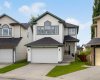 Welcome to 292 Tuscany Ridge View SW — a classic two-storey on a quiet cul-de-sac, walking distance to every school in Tuscany, with a backyard you have to see to believe.