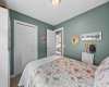 With its own closet and a cheerful outlook, this room works just as well for a kid, a teen, or overnight guests.