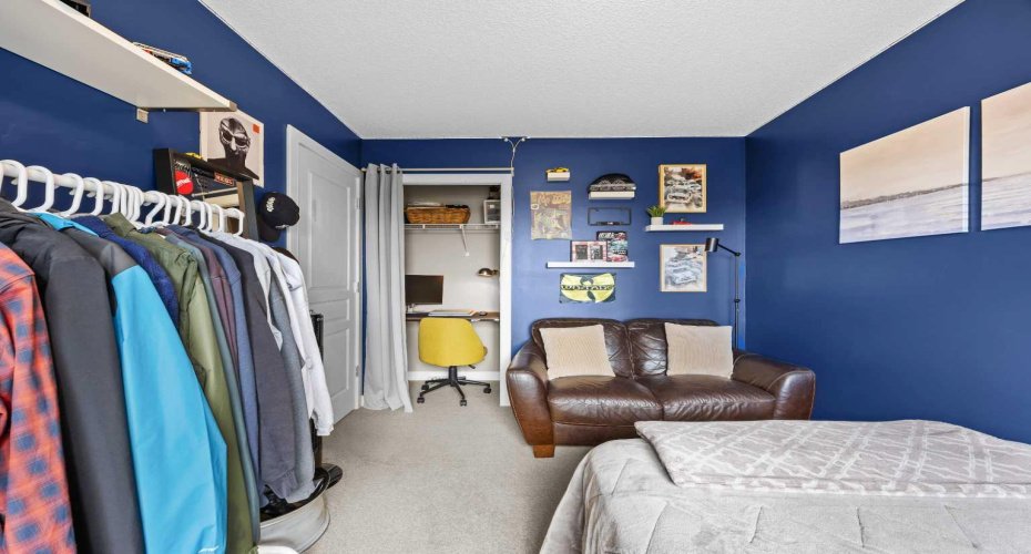 The closet nook currently doubles as a clever study corner — proof this room flexes easily between sleep space, homework hub, and hangout zone.