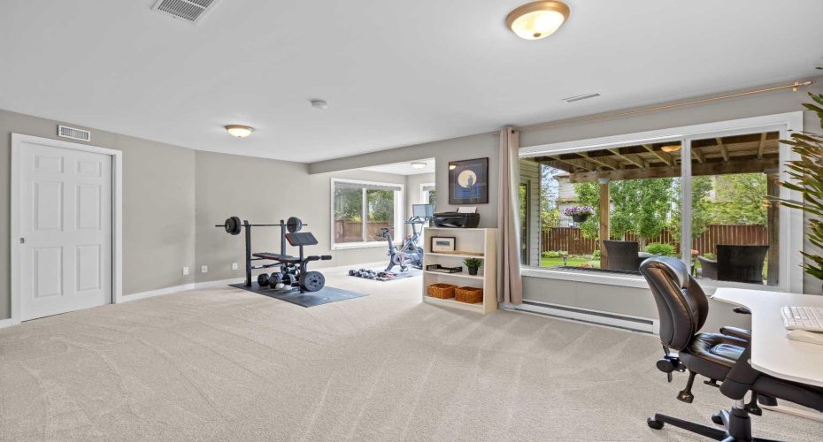 This level flexes with your family: workout zone today, games room tomorrow, media space next season — the square footage is here for all of it.