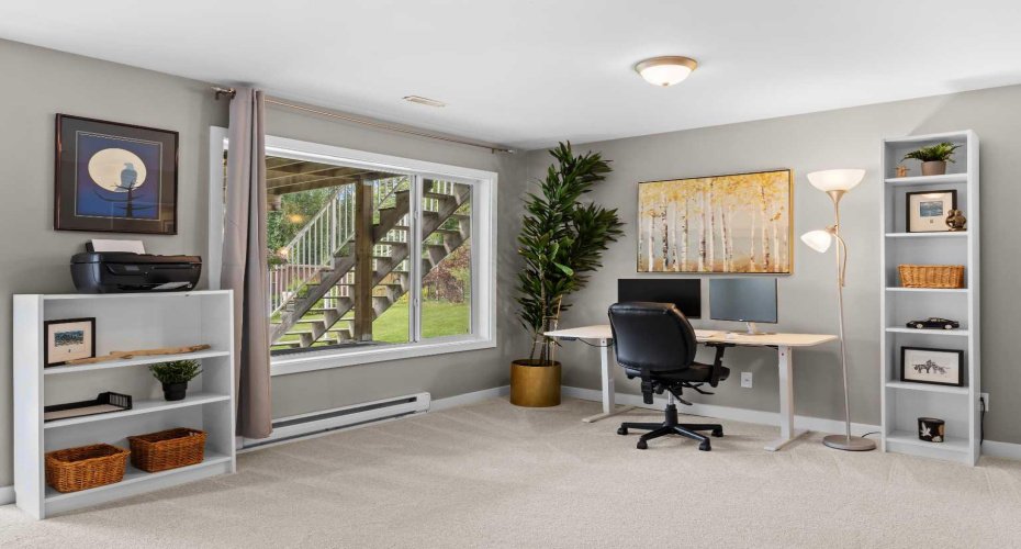With garden-level views and all this natural light, "working from home" down here doesn't feel like a compromise.