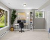Above-grade windows and the walkout make this one of those rare basements that never actually feels like a basement.