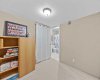 Tucked beside a full bathroom, this space adapts easily for guests, teens, or extended stays.