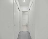 Double closets on both sides lead straight through to the ensuite — storage that's actually thought through.