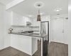Genuinely elevated and intentionally finished, with the waterfall edge on full display and a layout that keeps everything within reach.