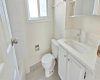 Upper full bathroom with quartz vanity top and new faucet