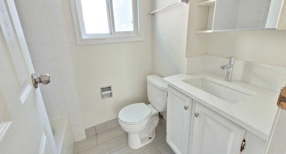 Upper full bathroom with quartz vanity top and new faucet