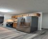 Brand new stainless French doors fridge.