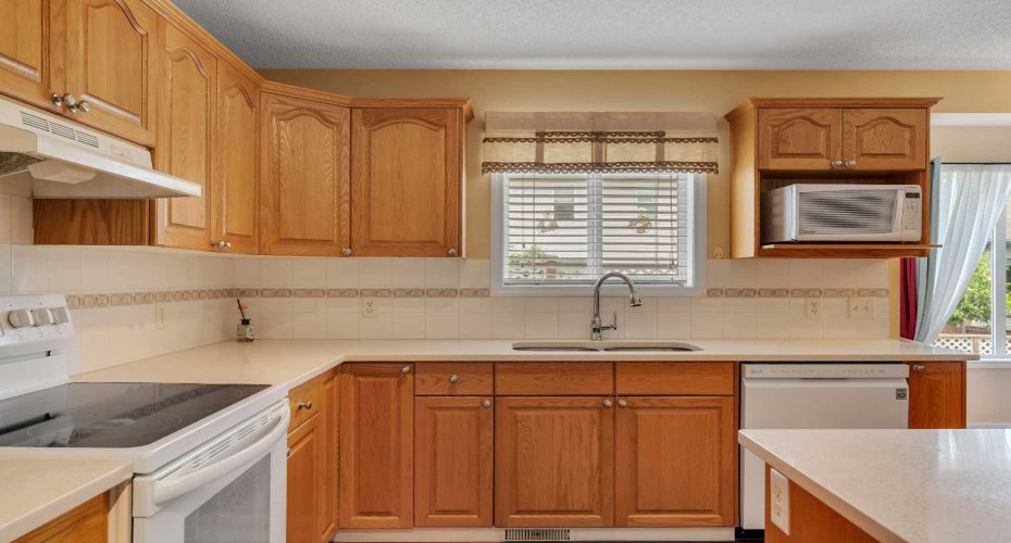 Alternate view of the kitchen.