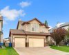 Triple attached garage with driveway parking!