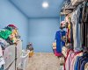 Walk in closet in basement