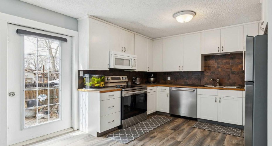 107 Elm Place, Okotoks, Alberta T1S 1J1, 4 Bedrooms Bedrooms, ,2 BathroomsBathrooms,Residential,For Sale,Elm,A2327584