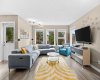 Big south-facing windows pour natural light across the open-concept main floor