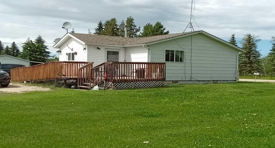 Back yard with deck and ramp