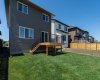 Rear elevation view virtually adedd landscaping