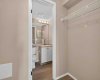 Spacious Walk-Through Closet in Primary Bedroom