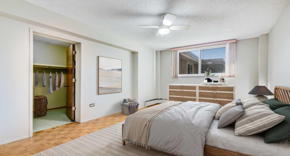 The primary bedroom features a large walk-in closet