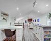 Raised ceilings and city skyline views throughout.