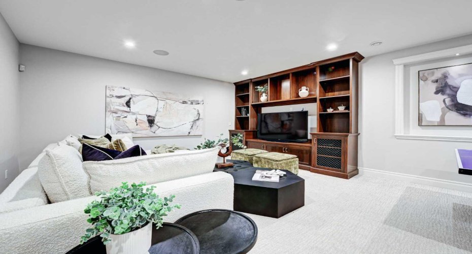Great rec area with built-ins and high ceilings.