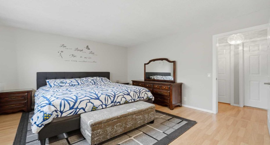 Large Primary bedroom with his and hers closets