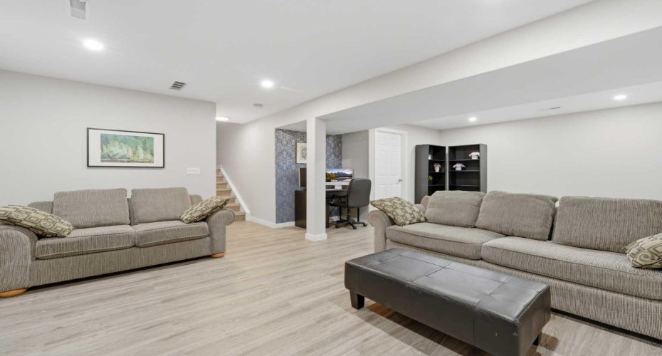 Fully finished basement with spacious rec room with new LVP flooring