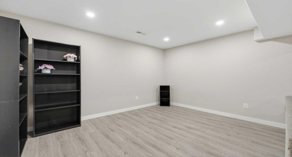 Fully finished basement with spacious rec room with new LVP flooring