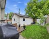Large back yard with double detached garage
