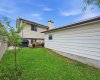 Large back yard with double detached garage