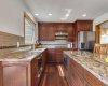 24 Woodgrove Crescent, Calgary, Alberta T2W 3Z1, 6 Bedroom Bedrooms, 0 ,4 BathroomBathrooms,Residential,For Sale,Woodgrove,0,A2326744