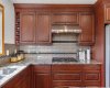 24 Woodgrove Crescent, Calgary, Alberta T2W 3Z1, 6 Bedroom Bedrooms, 0 ,4 BathroomBathrooms,Residential,For Sale,Woodgrove,0,A2326744