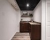 (Adding virtual unattached goods (chattels) of realistic size to property photos in order to give perspective on room dimensions.)