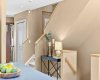 A styled landing area offers a lovely spot to display favourite pieces.