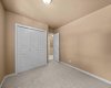 A third upper-level bedroom includes a closet and flows easily into the hallway.