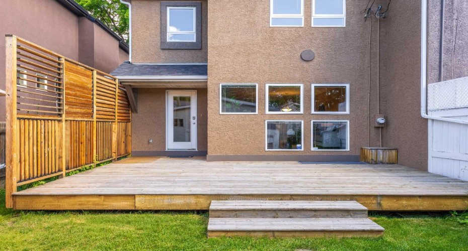 The deck's cedar privacy screen adds a stylish touch while keeping the outdoor space feeling secluded.